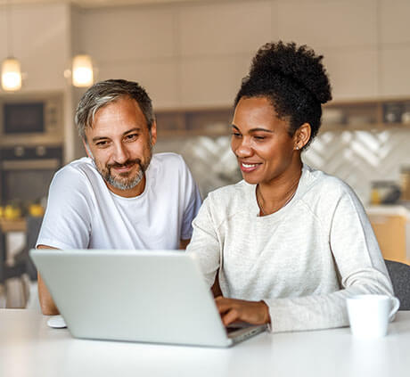 Couple discussing their home refinance